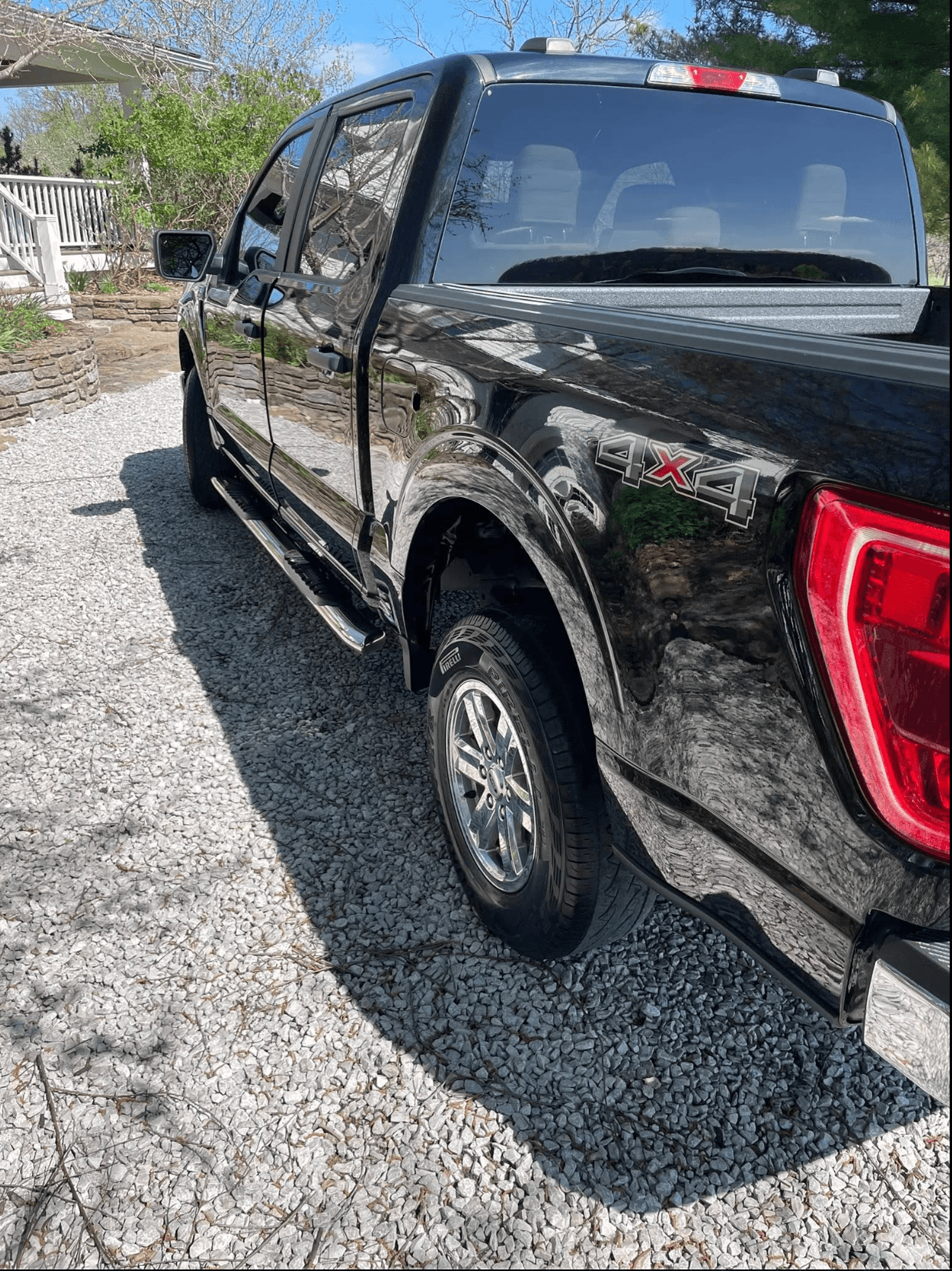 Black Ford F-150 4x4 detailed by ProGloss in Olathe, KS — exterior shine after a full mobile detail